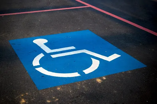 fresh stamped asphalt for ADA compliance for handicap parking.